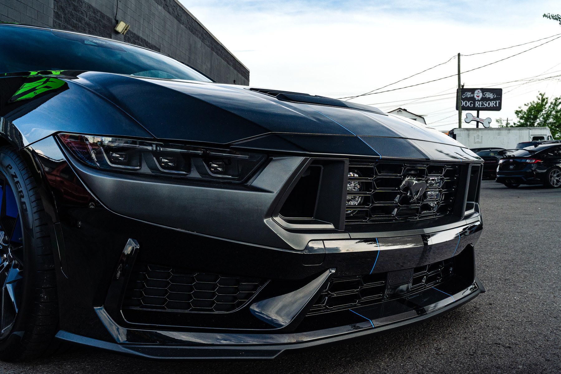 Front splitter and headlight detail on a 2024 Ford Mustang Dark Horse