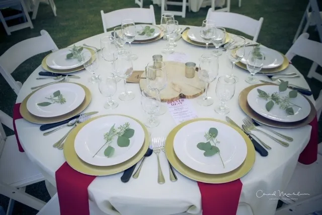 Elegant wedding reception table setting showcasing amenities included in all-inclusive packages