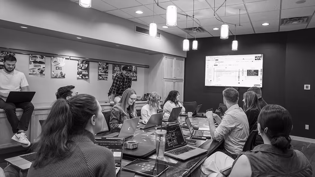 team of employees focused in a meeting at Lawrence & Schiller headquarters, Sioux Falls, SD