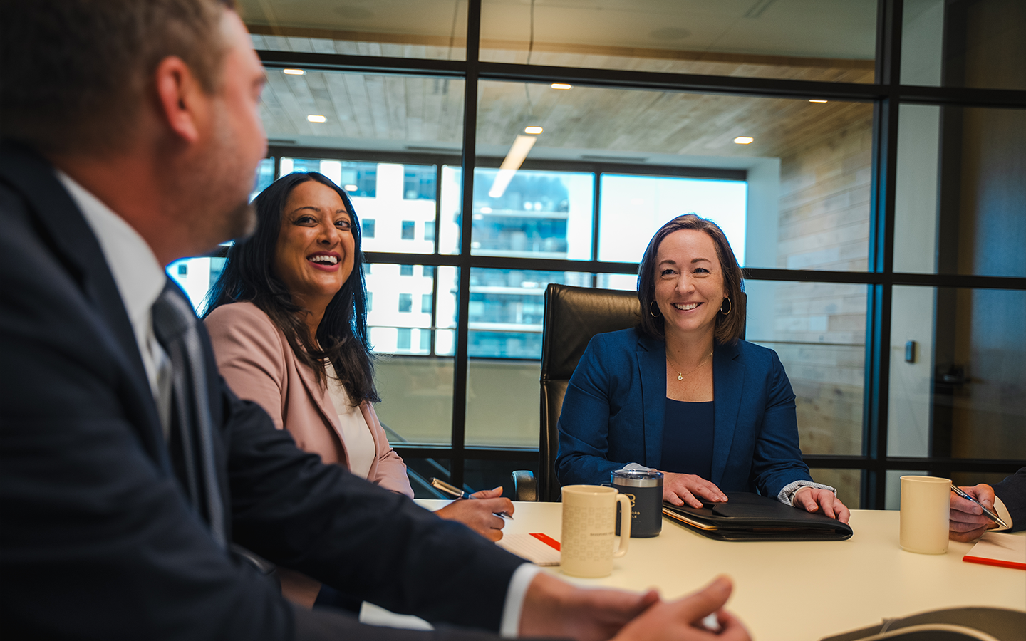 Bassford Remele attorneys in a meeting | Lawrence & Schiller Creative Case Studies - Bassford Remele