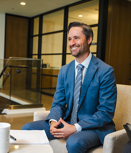 Bassford Remele attorney listening in a meeting | Lawrence & Schiller Creative Case Studies - Bassford Remele