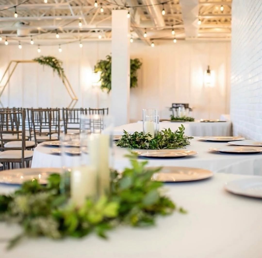 Outdoor patio reception at dusk with festoon lights