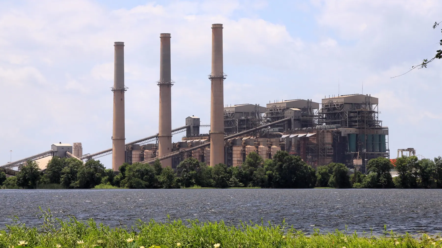 Martin Lake Power Plant, a coal-fired station in Texas, with its stacks and cooling reservoir