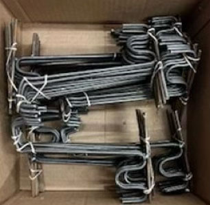 Rebar hangers for suspending reinforcement at mid-slab depth in elevated deck pours.