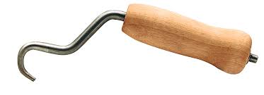 Manual bag tie tool for securing rebar wire ties quickly by hand.