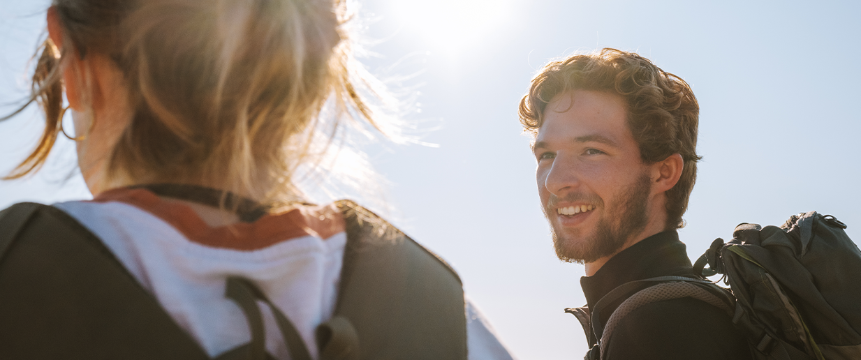 Hikers, man smiling.