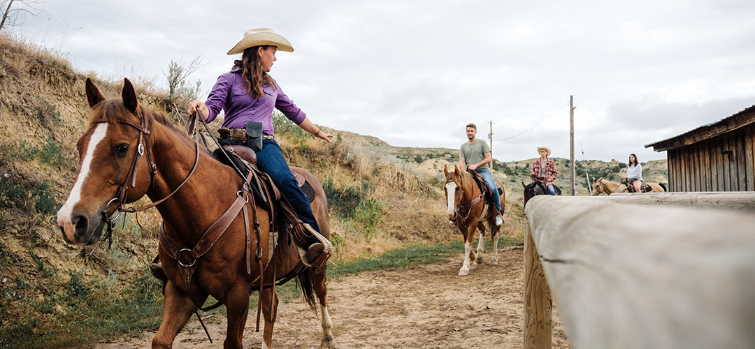 Group of people riding horses