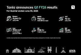 Business professionals comfortable with technology. Working on laptop.