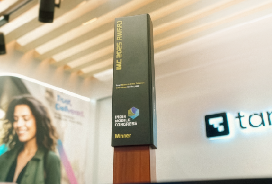 Business professionals comfortable with technology. Working on laptop.