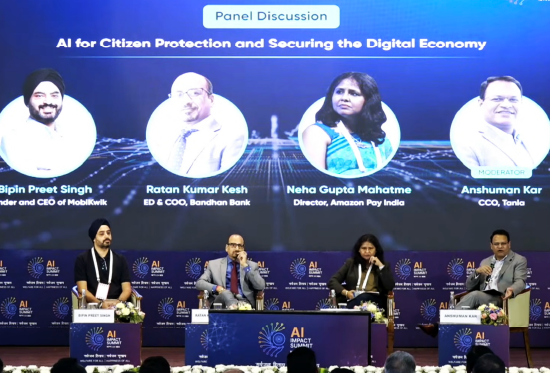 Business professionals comfortable with technology. Working on laptop.