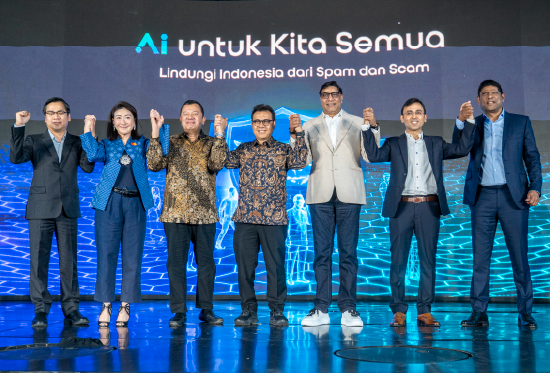 Business professionals comfortable with technology. Working on laptop.