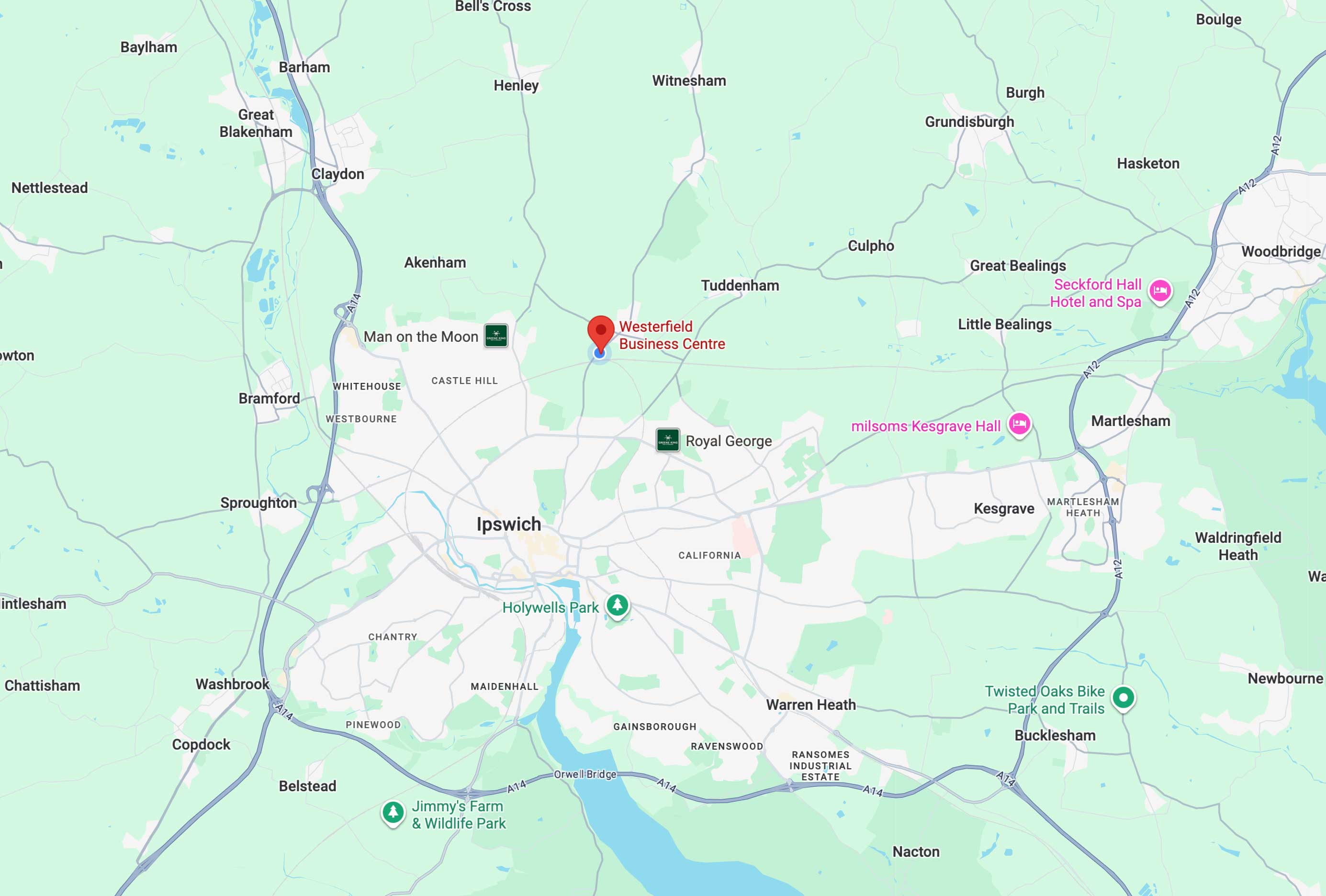 Map showing Ipswich and surrounding areas in Suffolk, England, with marked locations including Westerfield Business Centre, Man on the Moon pub, Royal George pub, Seckford Hall Hotel and Spa, milsoms Kesgrave Hall, Jimmy's Farm & Wildlife Park, and Twisted Oaks Bike Park and Trails.