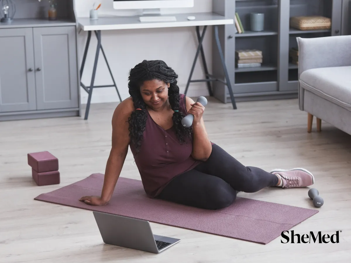 A women doing exercises at home.