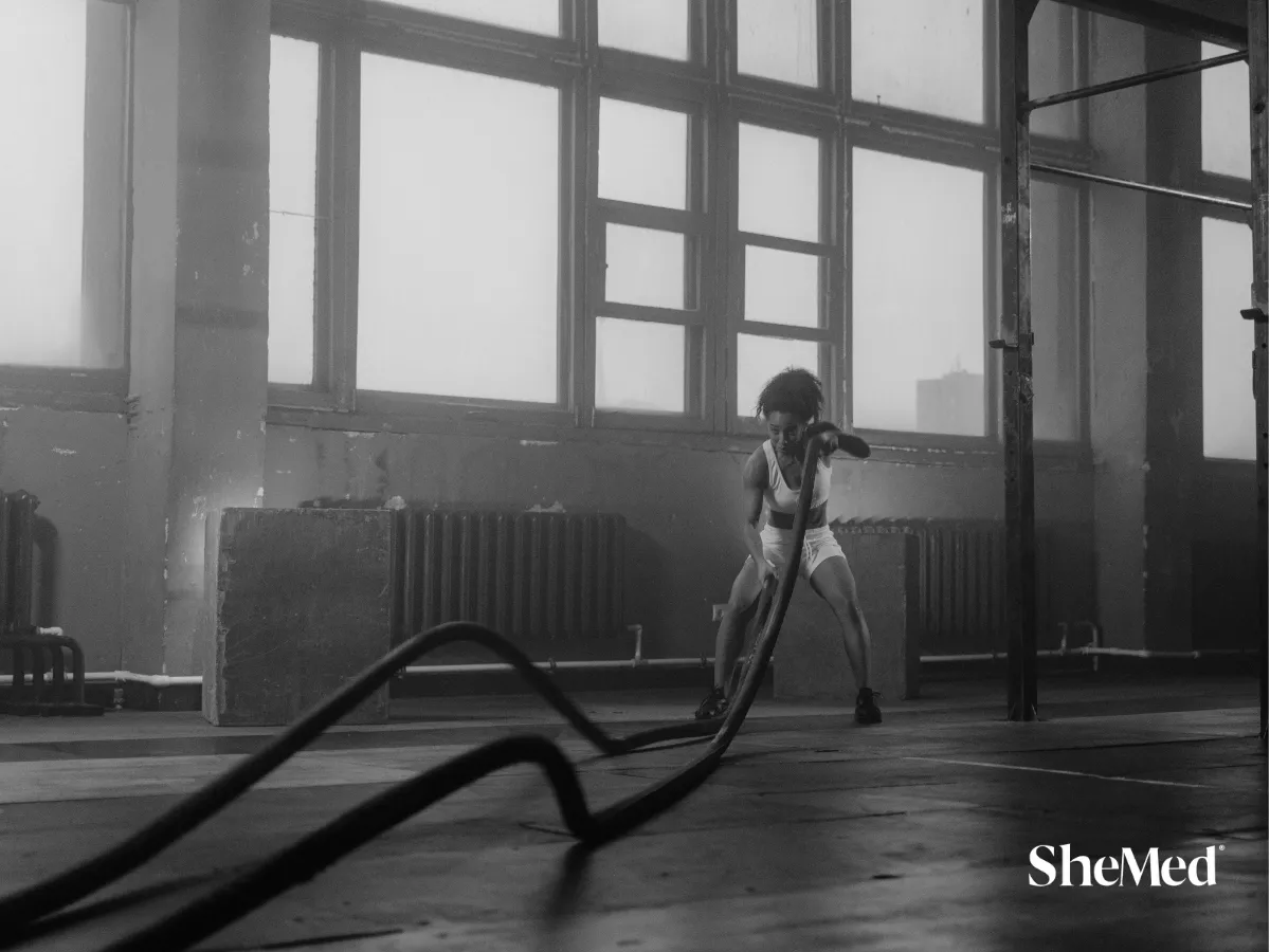 A women doing exercises with a rope.