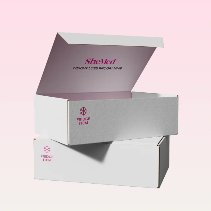 Two white rectangular boxes labeled 'FRIDGE ITEM' with one box open showing 'SheMed Weight Loss Programme' text inside the lid.