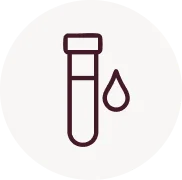 Icon of a test tube with a droplet beside it.