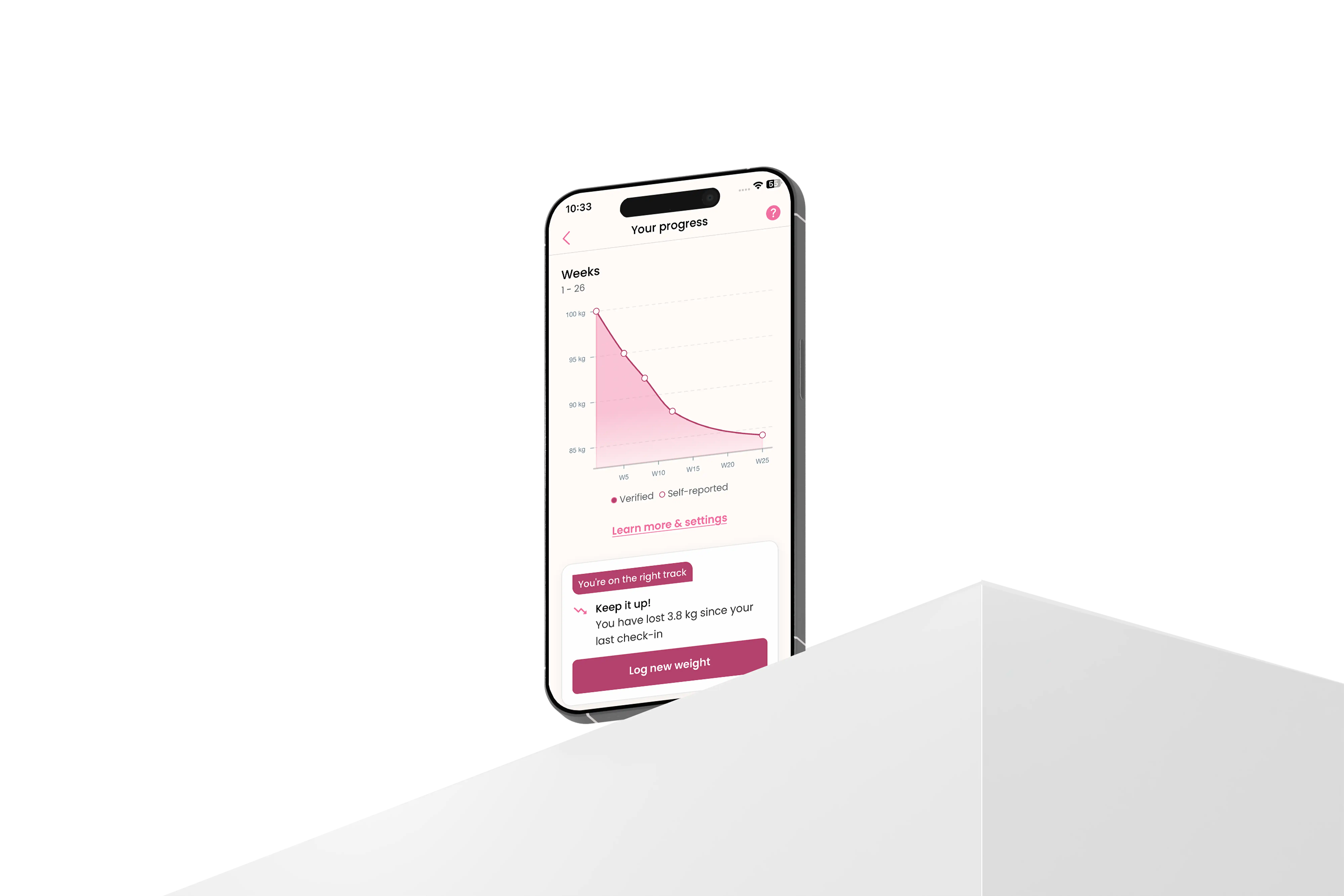 Smartphone displaying a weight loss progress graph from 100 kg to about 85 kg over 25 weeks, with a message encouraging to keep it up and a button to log new weight.