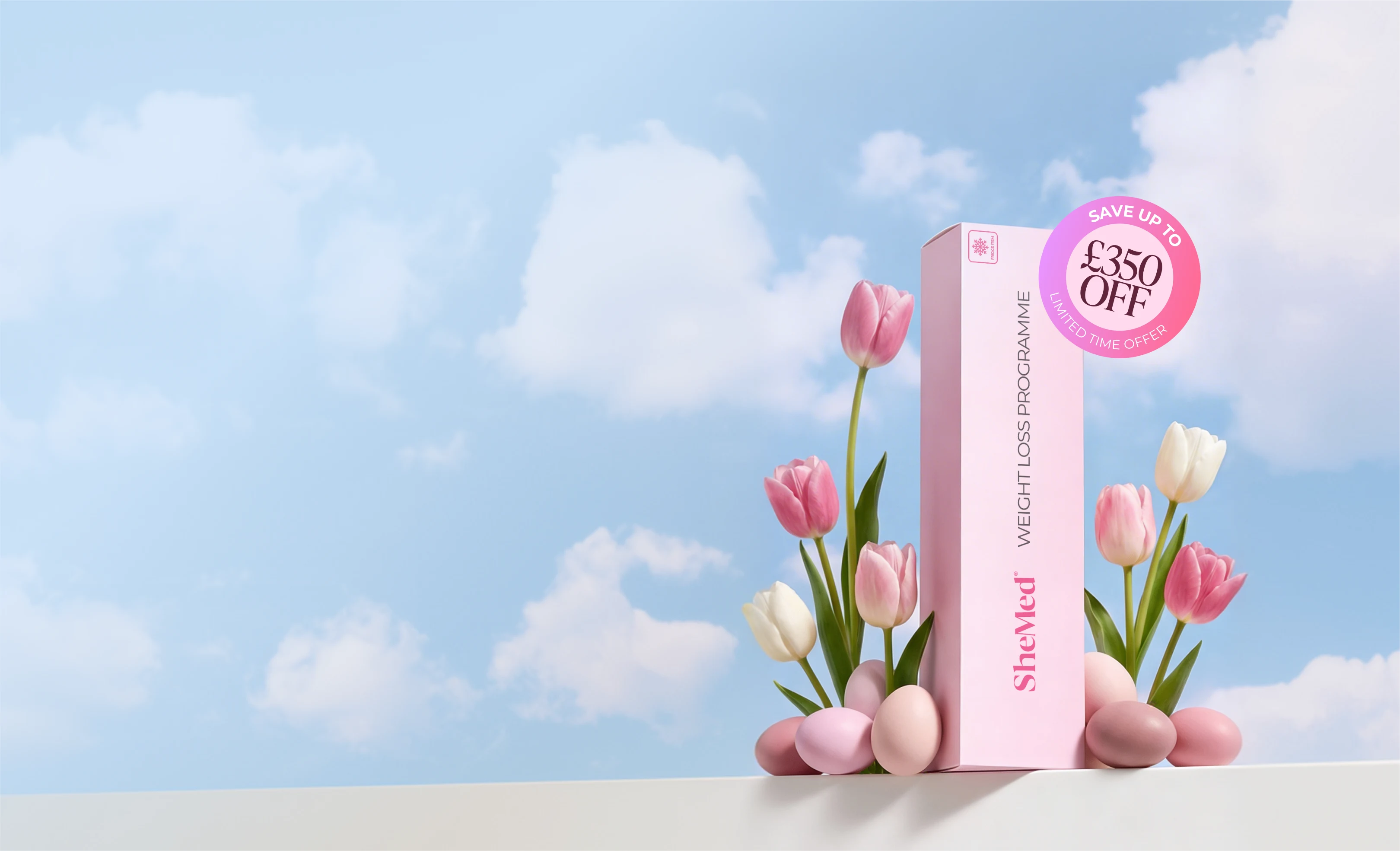 Pink SheMed weight loss programme box surrounded by pink and white tulips. daisies and easter eggs against a blue sky, with £175 off label.