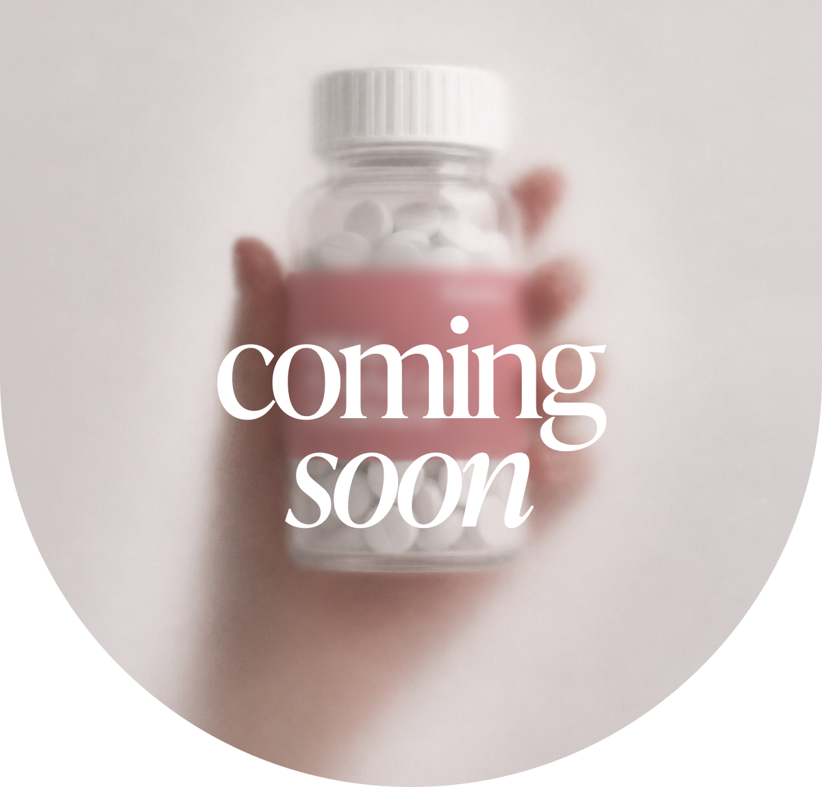Hand holding a pill bottle with a label and the words coming soon overlaid.