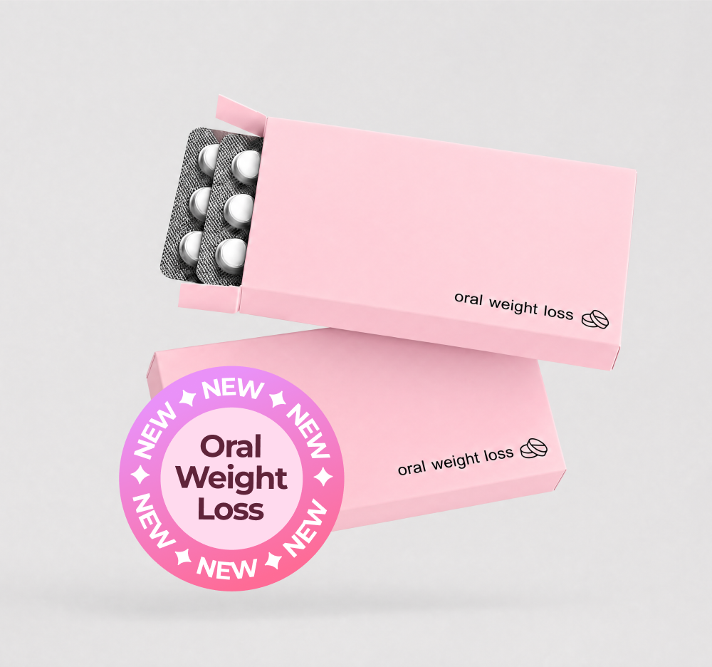 Two SheMed pink oral weight loss programme boxes open to reveal blister packs of white tablets, showing the monthly medication supply included in SheMed's clinician-led weight loss treatment for UK women.