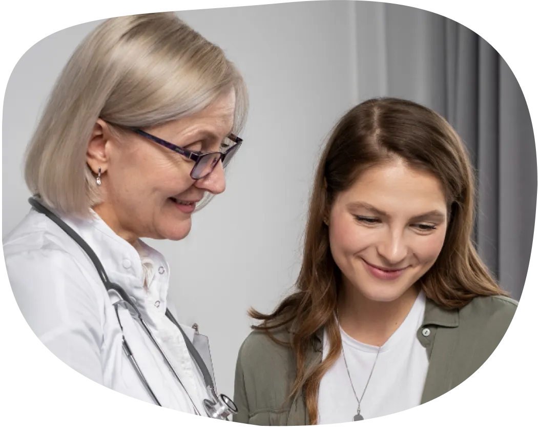 Two healthcare professionals reviewing information together