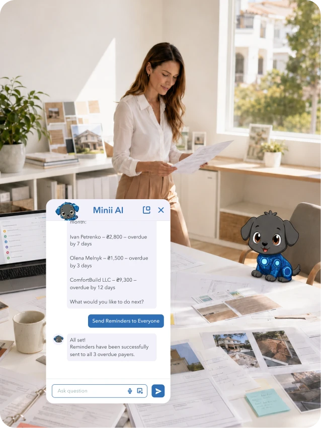 Woman reviewing papers at desk with laptop, documents, and a chatbot window showing overdue payment reminders.