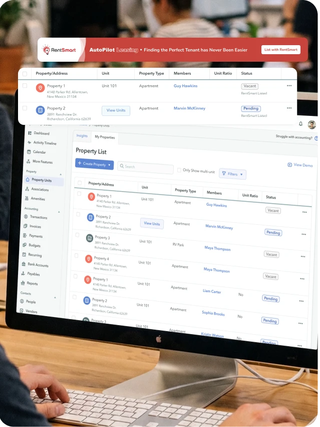 Computer screen showing RentSmart property management software with property listings and tenant info.