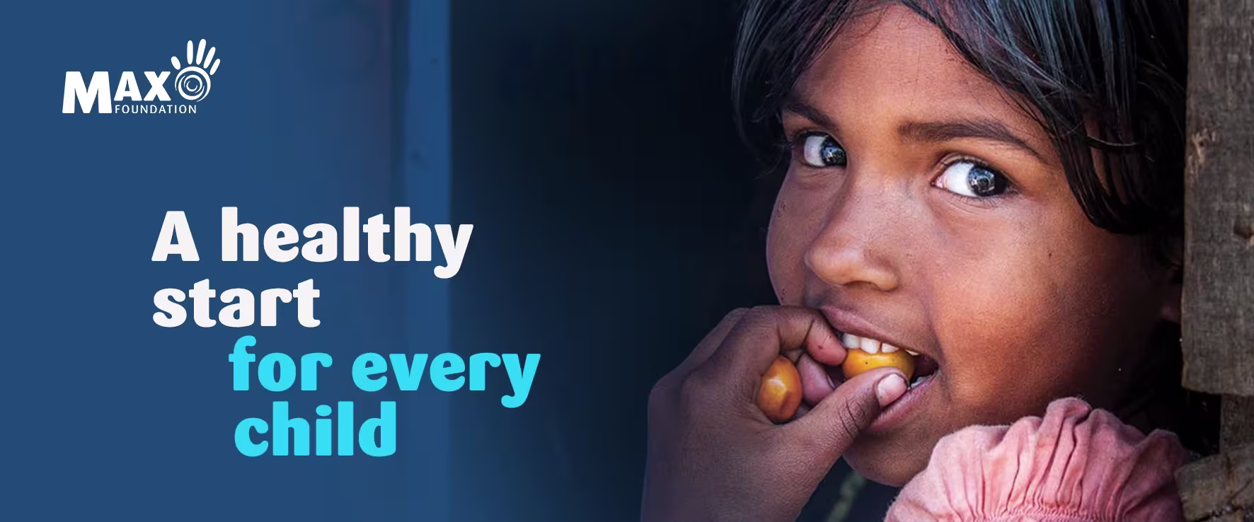 Een jong meisje eet iets met haar hand, naast tekst "A healthy start for every child" en het Max Foundation logo.