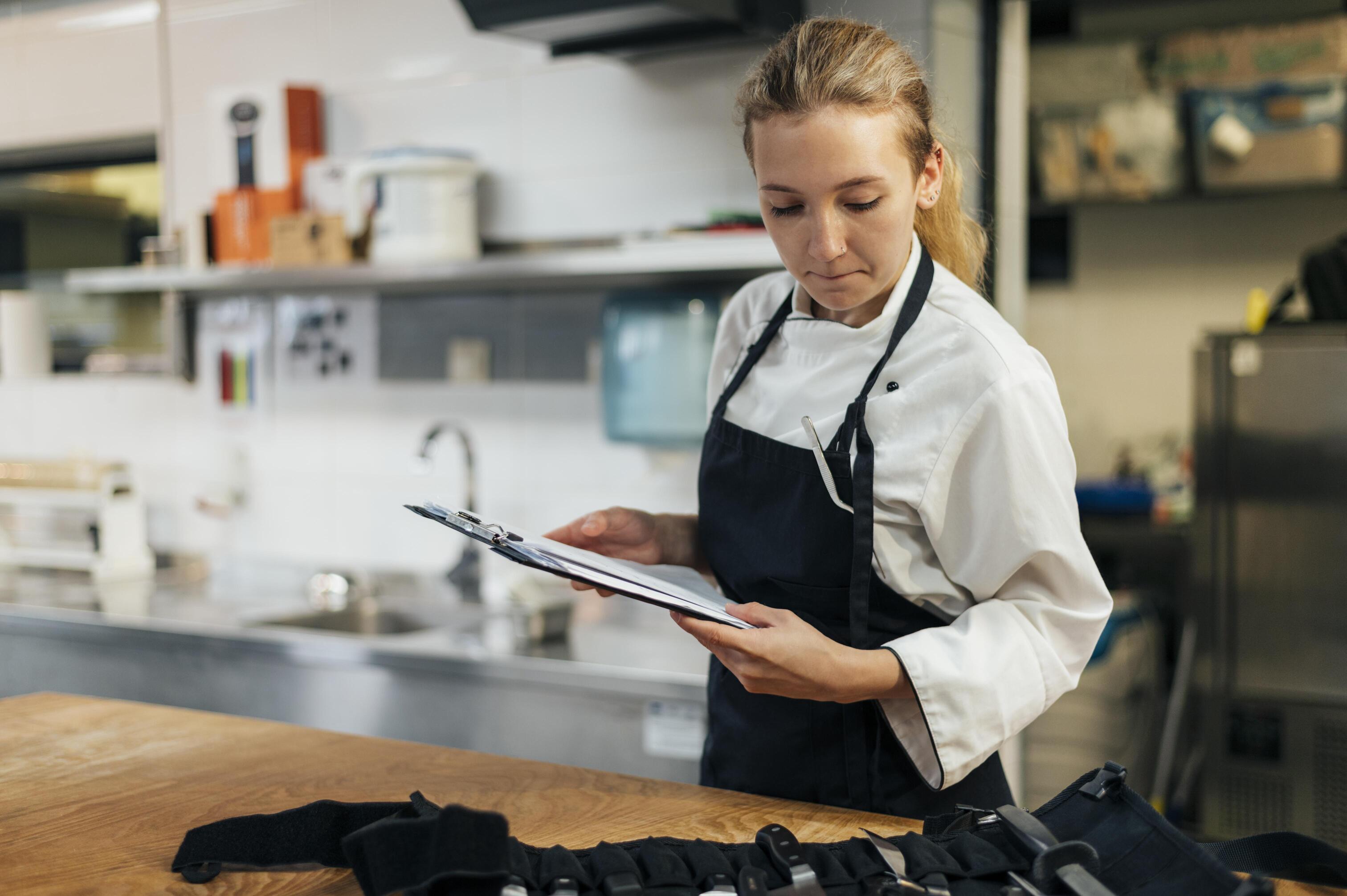 Food Standards Agency HACCP compliance documentation displayed in a commercial kitchen