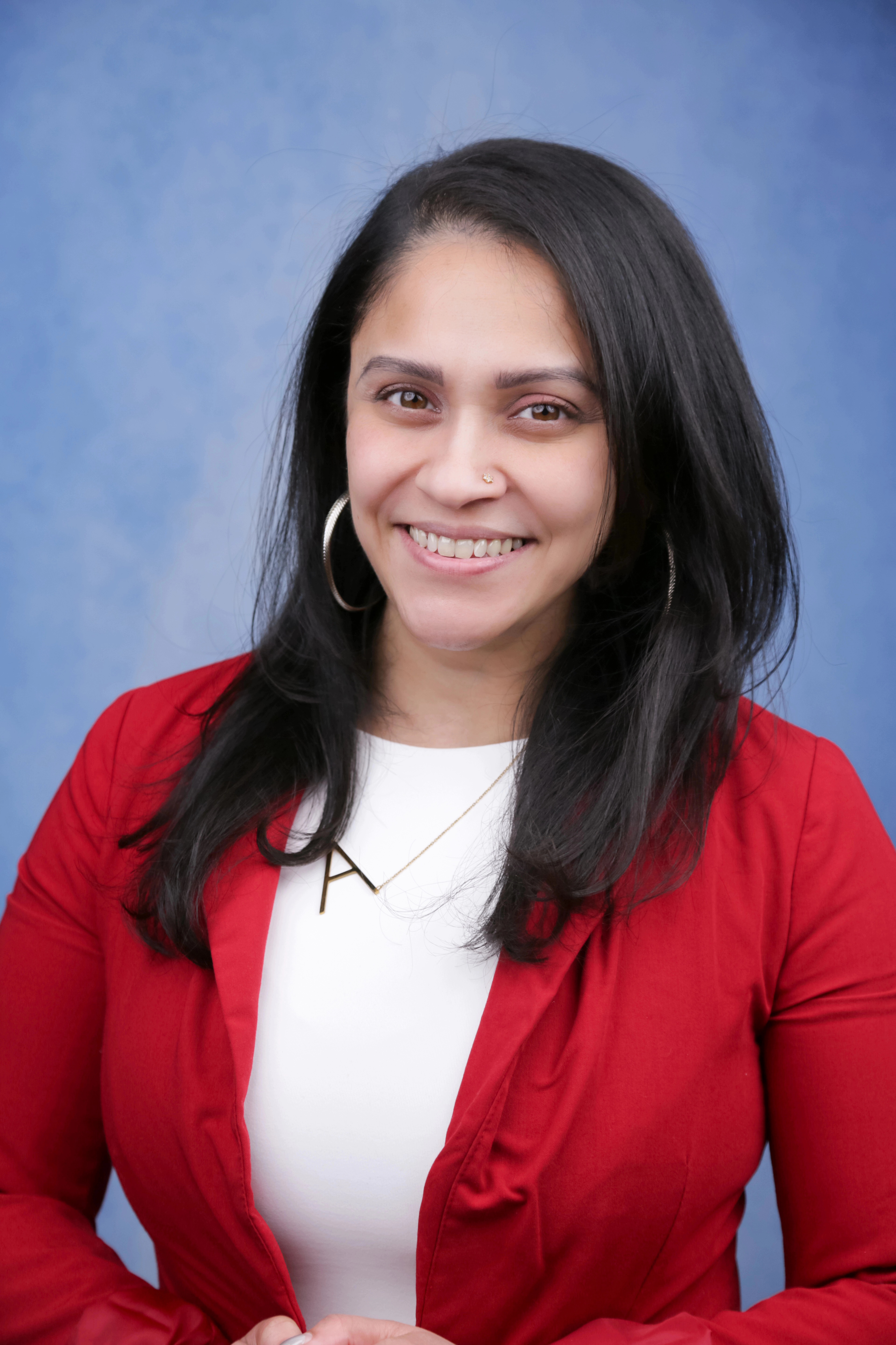 Neeta Ahmed smiling in professional staff portrait photo