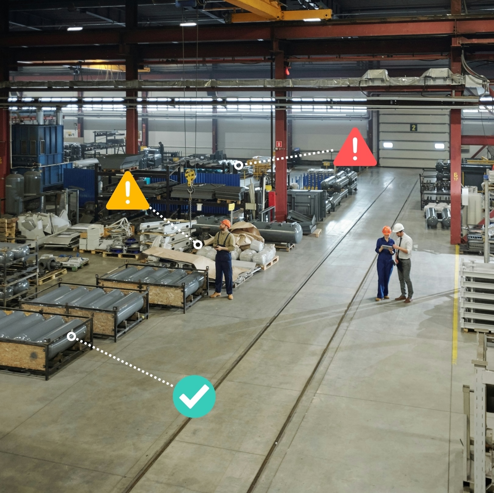 Man wearing blue helmet operating a yellow forklift inside a spacious industrial warehouse.