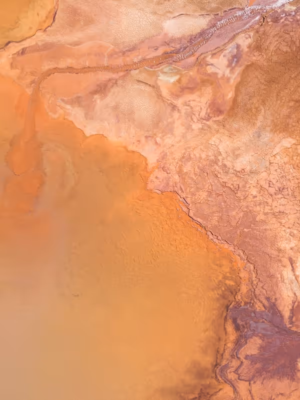 An aerial view of the vibrant and colorful waters surrounding the RioTinto mines in Huelva