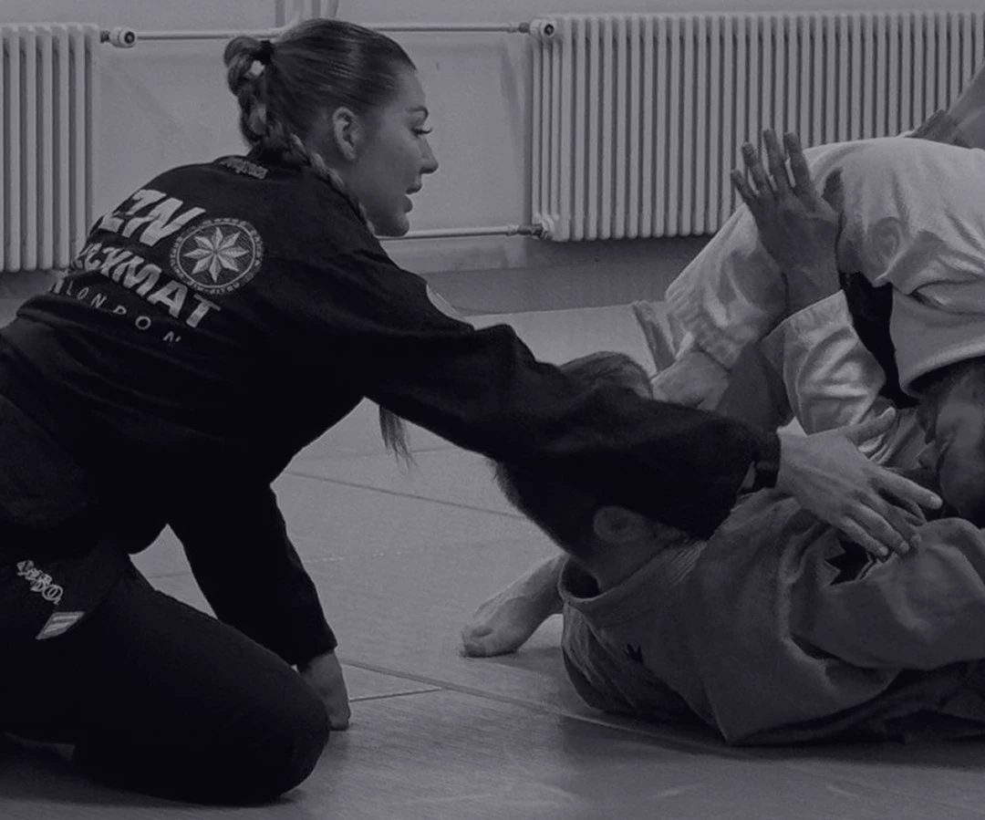 Guest coach helping students with bjj technique in Regensburg