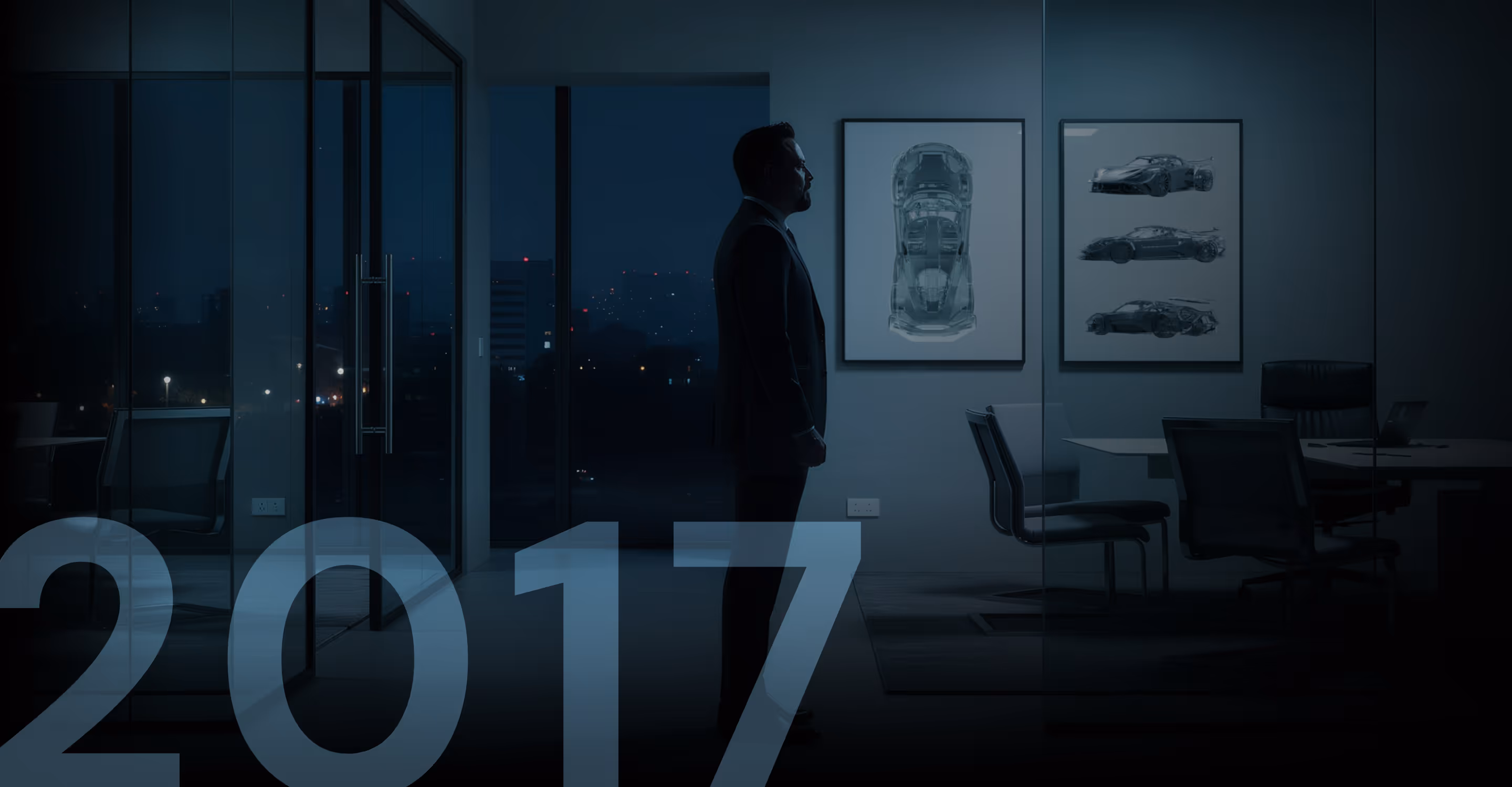 Silhouette of a man in a suit standing in a glass-walled office at night with framed car blueprints on the wall and city lights in the background.