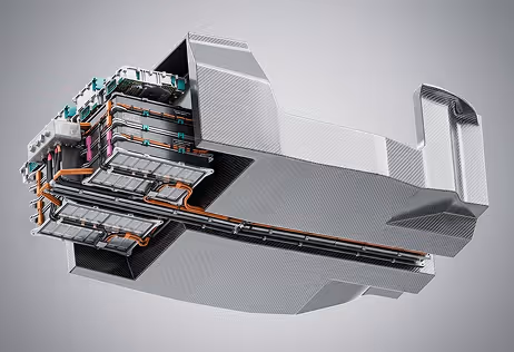 3D rendering of a complex mechanical or electronic component with interconnected parts and copper wiring on a gray background.