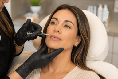 Woman receiving dermal fillers treatment to restore facial volume in Basking Ridge, New Jersey