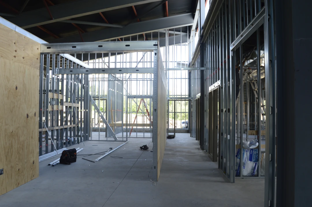 inside under construction building wall frames