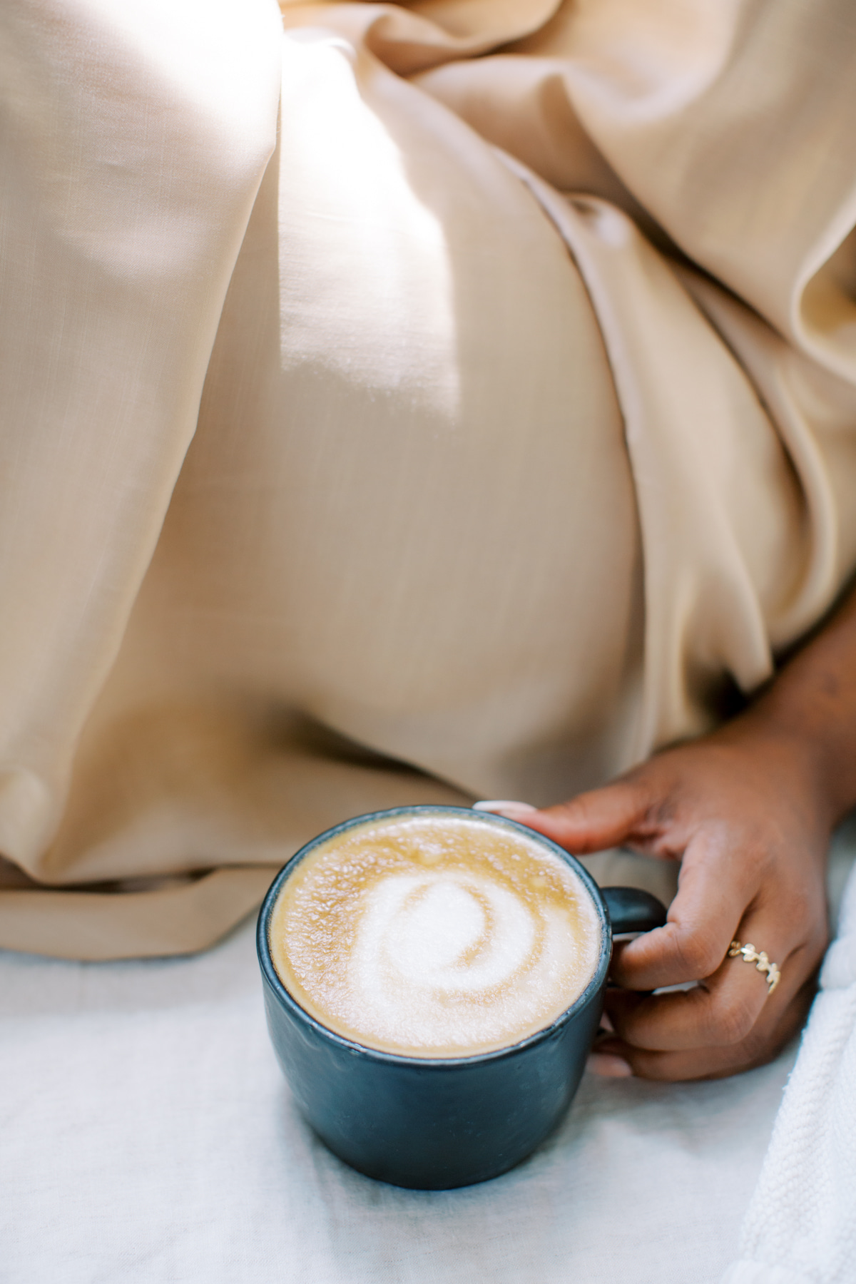 woman holding a cup of coffee