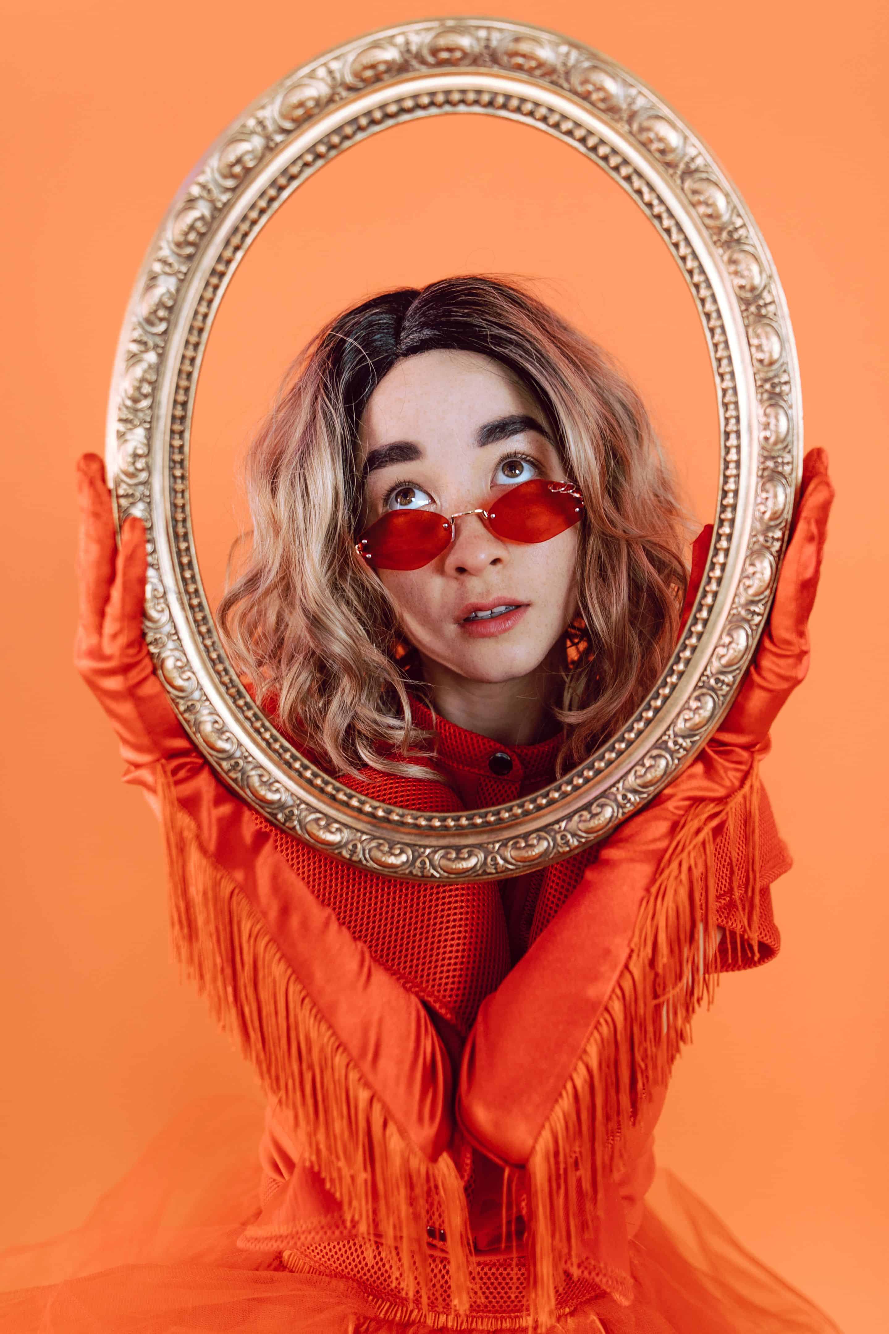 woman holding a mirror