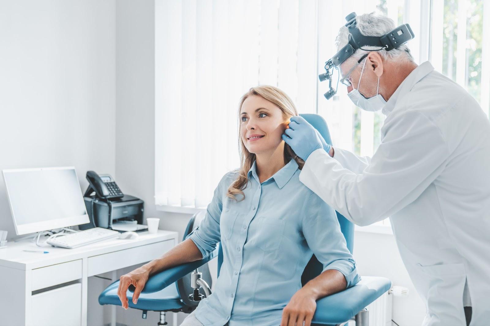 Female patient visiting an audiologist