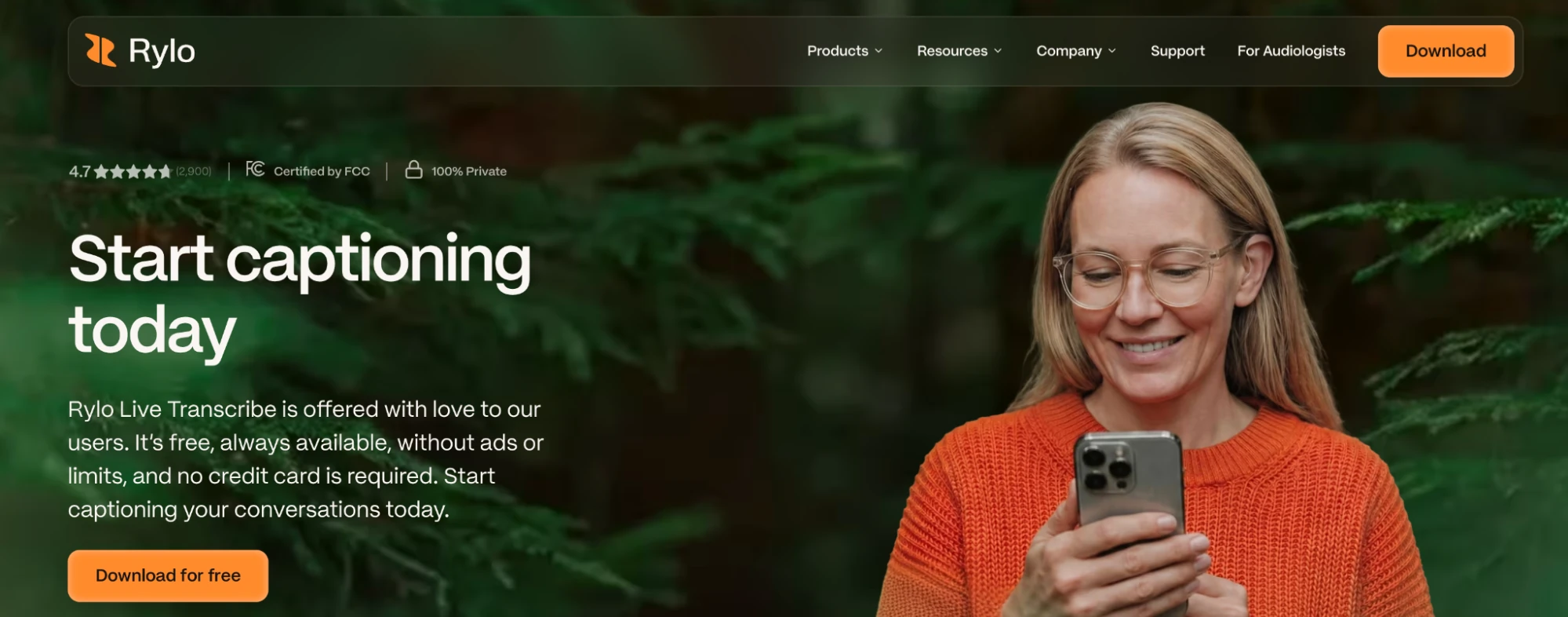 Rylo homepage showing a person using the Live Transcribe app with free real-time conversation captioning for people with hearing loss.