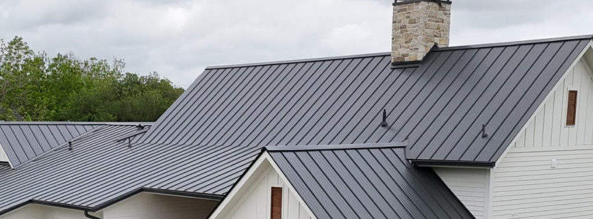 Close-up texture of roof shingles damaged by hail impact