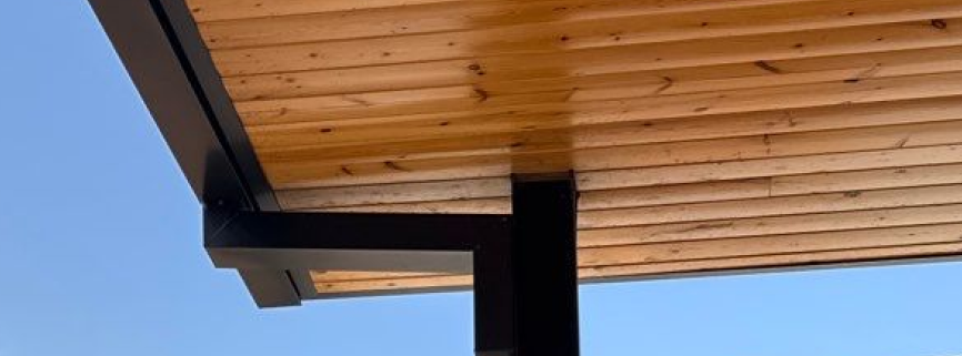 Close-up texture of roof shingles damaged by hail impact