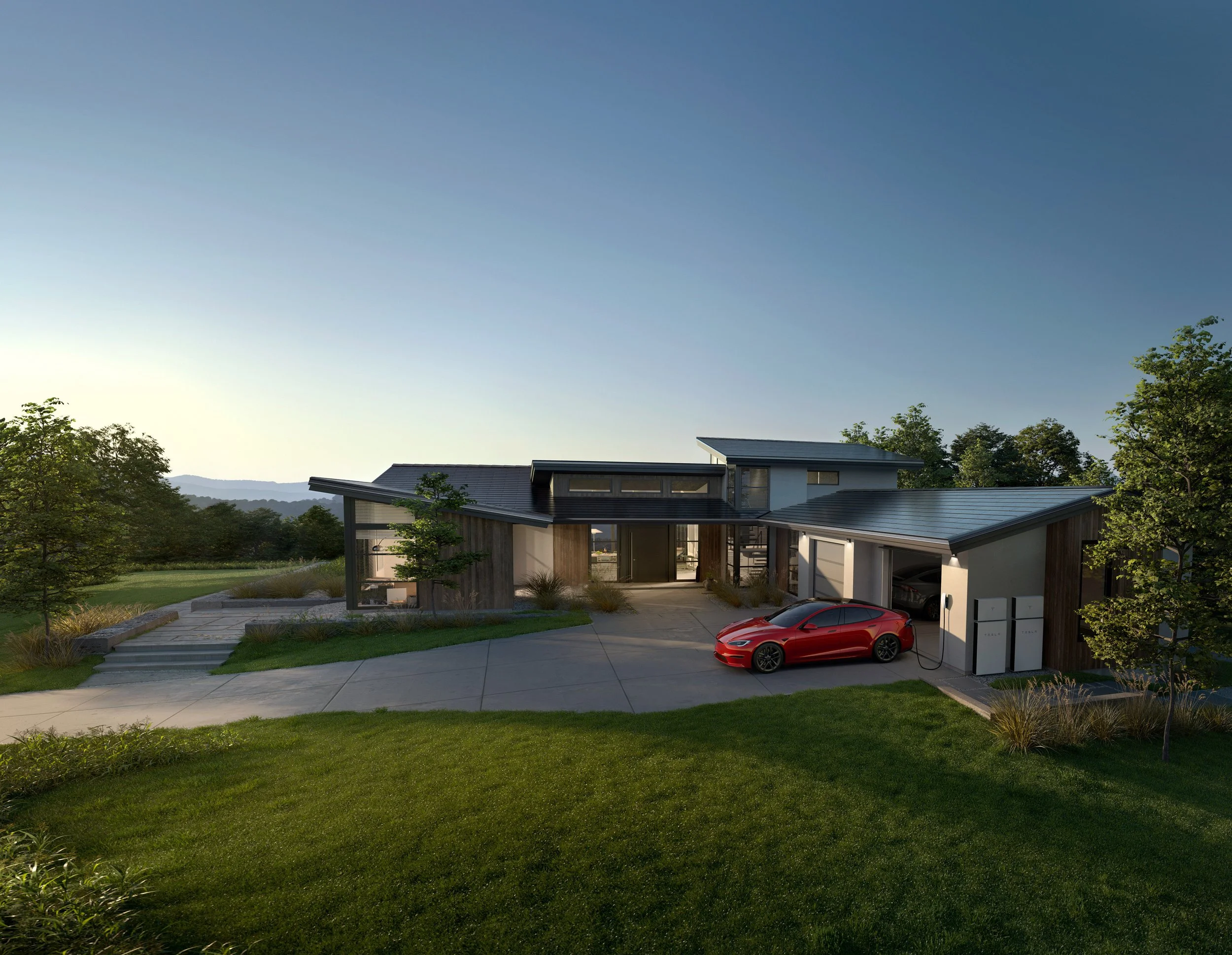 Modern Houston home featuring a Tesla Solar Roof at sunset