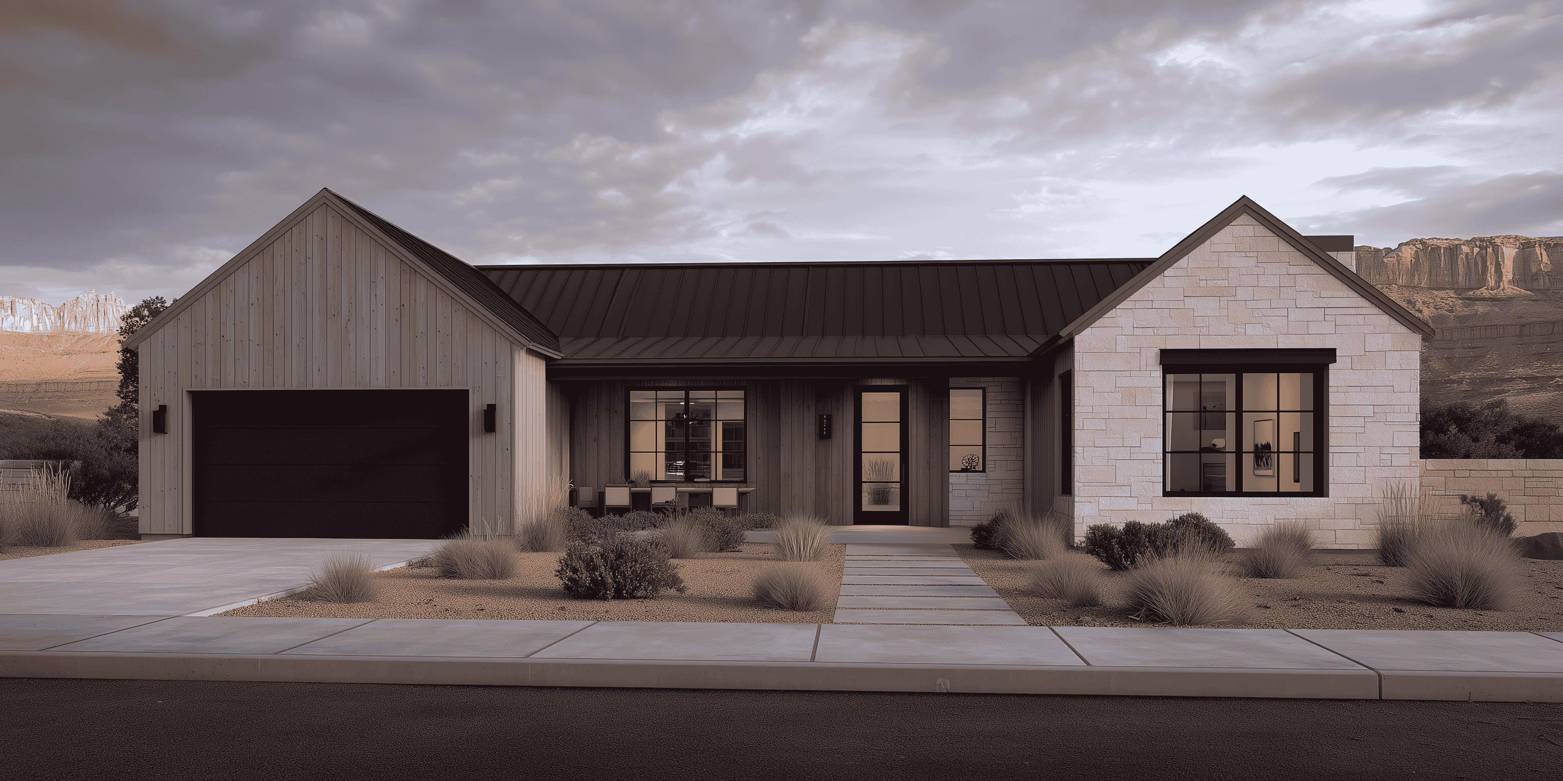 Single-story modern house with mixed wood and stone facade and desert landscaping in front.