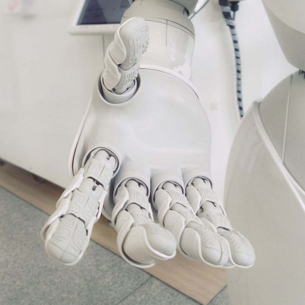 Asset investor reviewing adaptive robot rental unit in a modern warehouse facility in 2026