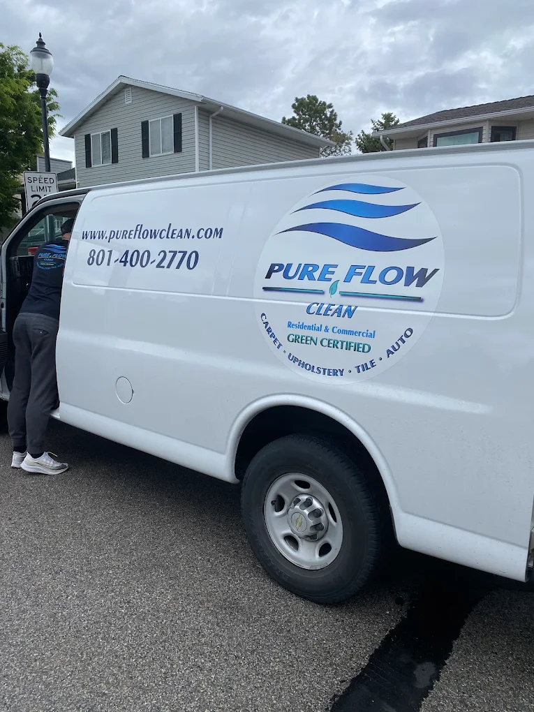 Pure Flow Clean green certified service van with technician