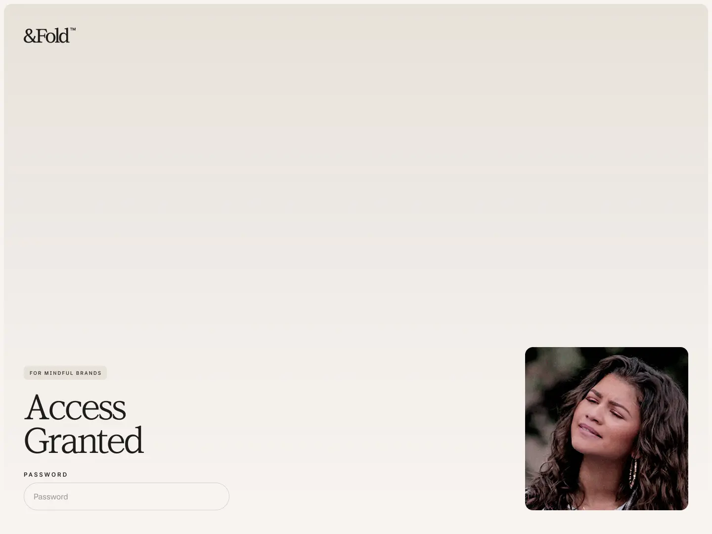 Login screen with text 'Access Granted' and a password input field, featuring a small image of a woman with curly hair and hoop earrings.