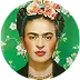 Portrait of Frida Kahlo wearing a floral headdress and colorful earrings against a green background with white flowers.