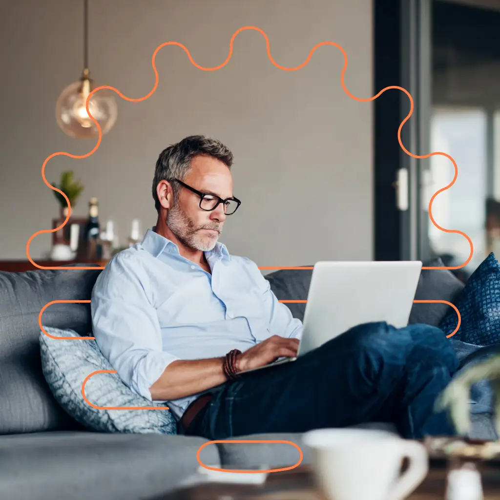 Man viewing a website on his laptop